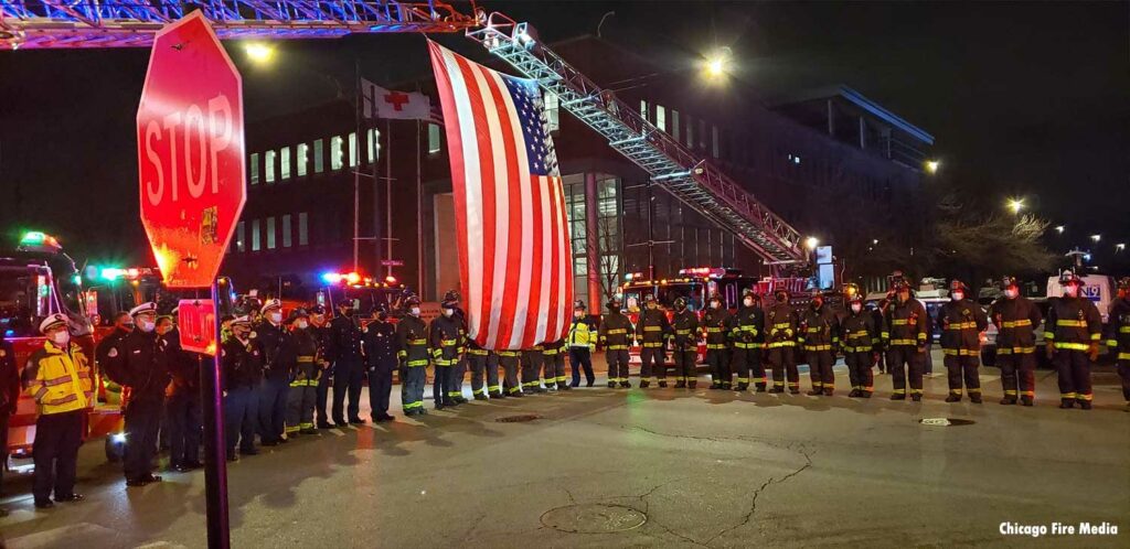 Chicago firefighter with flag and aerials