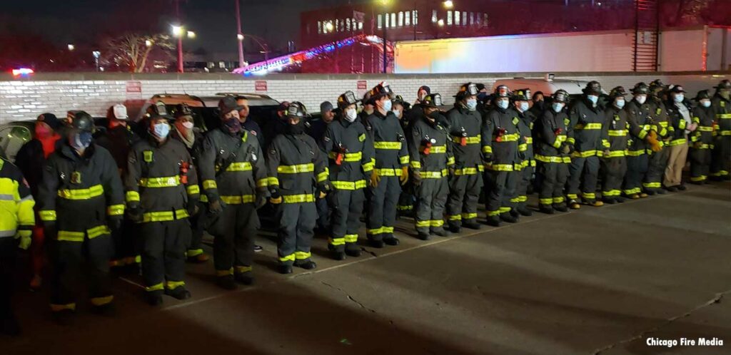 Chicago firefighters line route for Firefighter Plummer