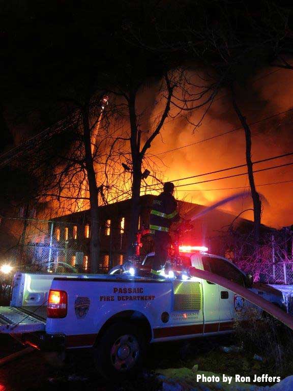 Passaic NJ firefighters at 11-alarm chemical plant fire