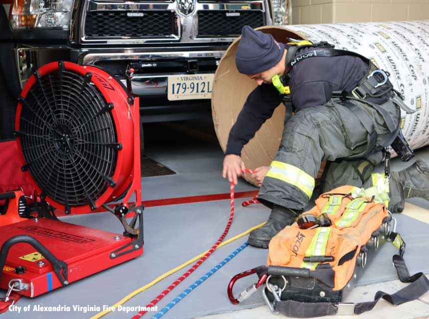 City of Alexandria VA firefighters construct props for confined space training.