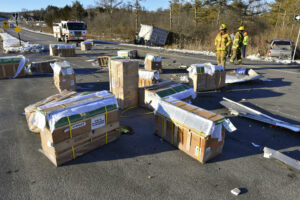 Firefighters with monkey crates