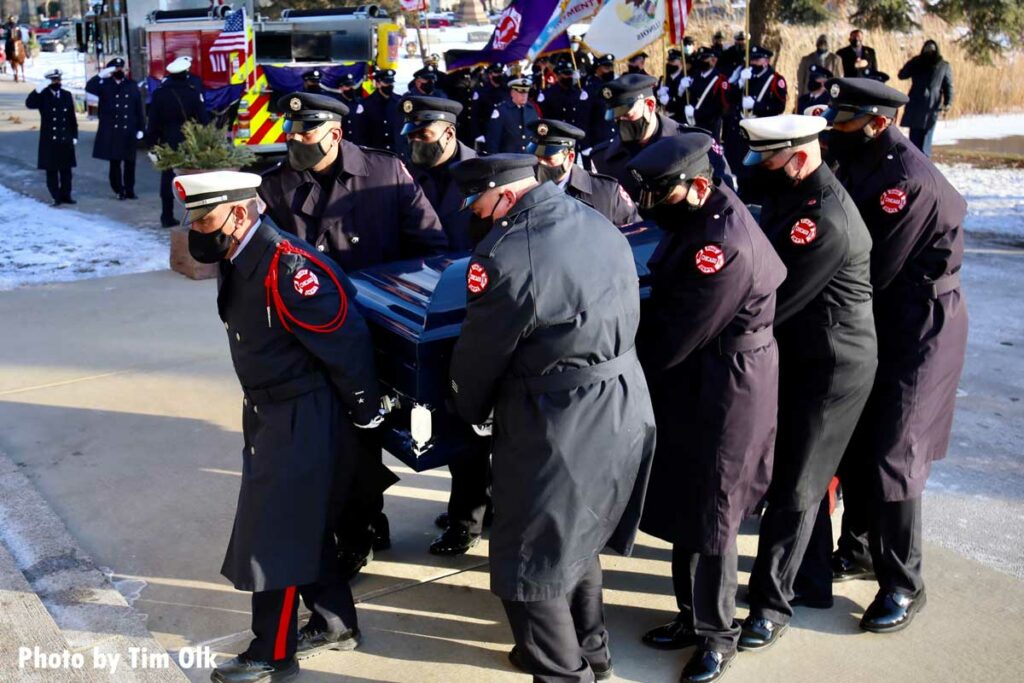 Chicago firefighters bring casket to fire engine