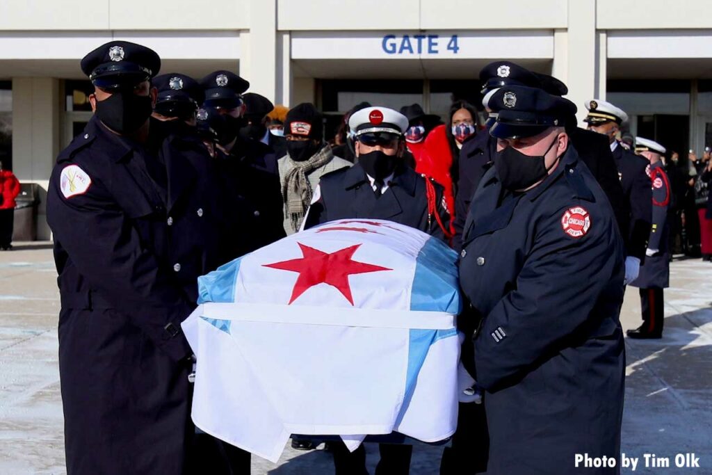 Firefighters load casket of fallen Chicago Firefighter