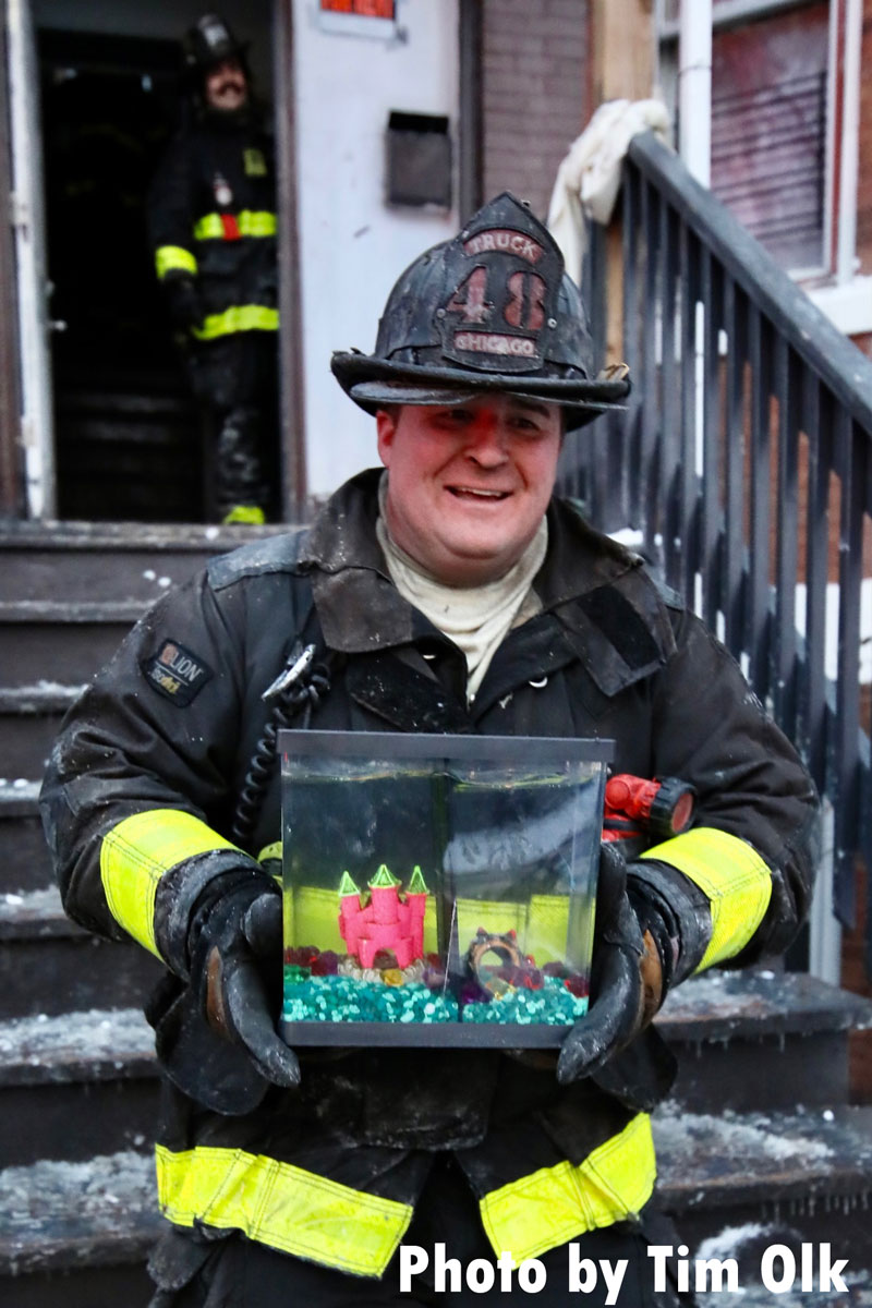 Chicago firefighter removes fish tank from home