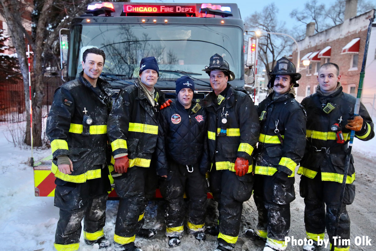 Chicago firefighters in front of fire truck