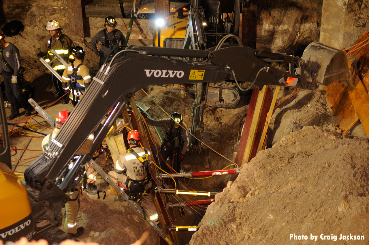 Firefighters use equipment at trench rescue