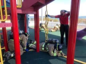 Firefighters training on playground