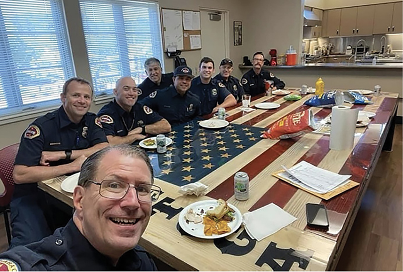 Firefighters at the firehouse kitchen table