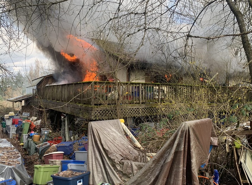 house fire with clutter