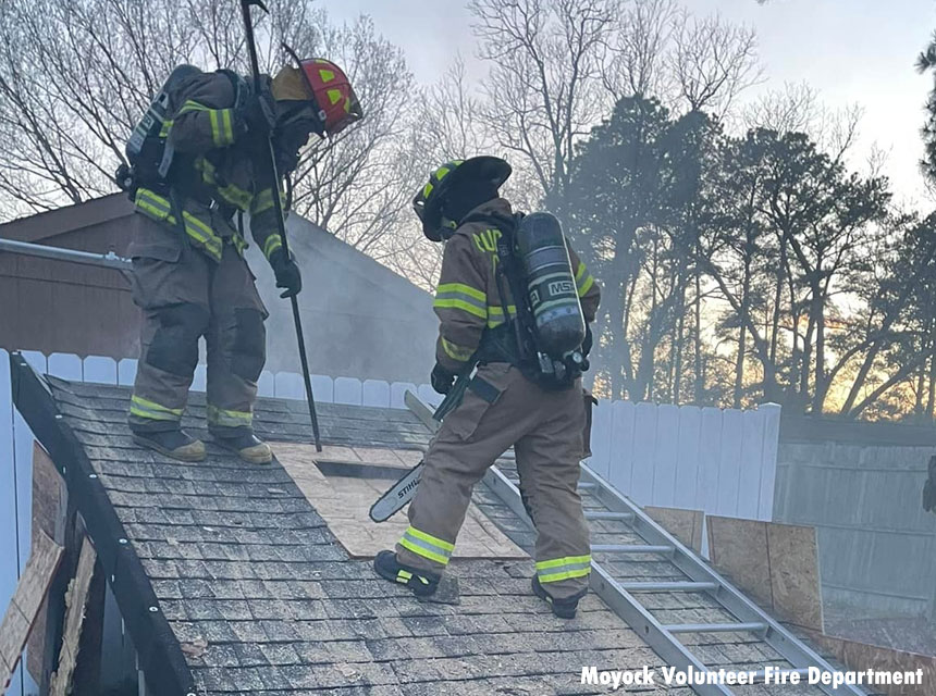 Firefighters cut roof on roof prop