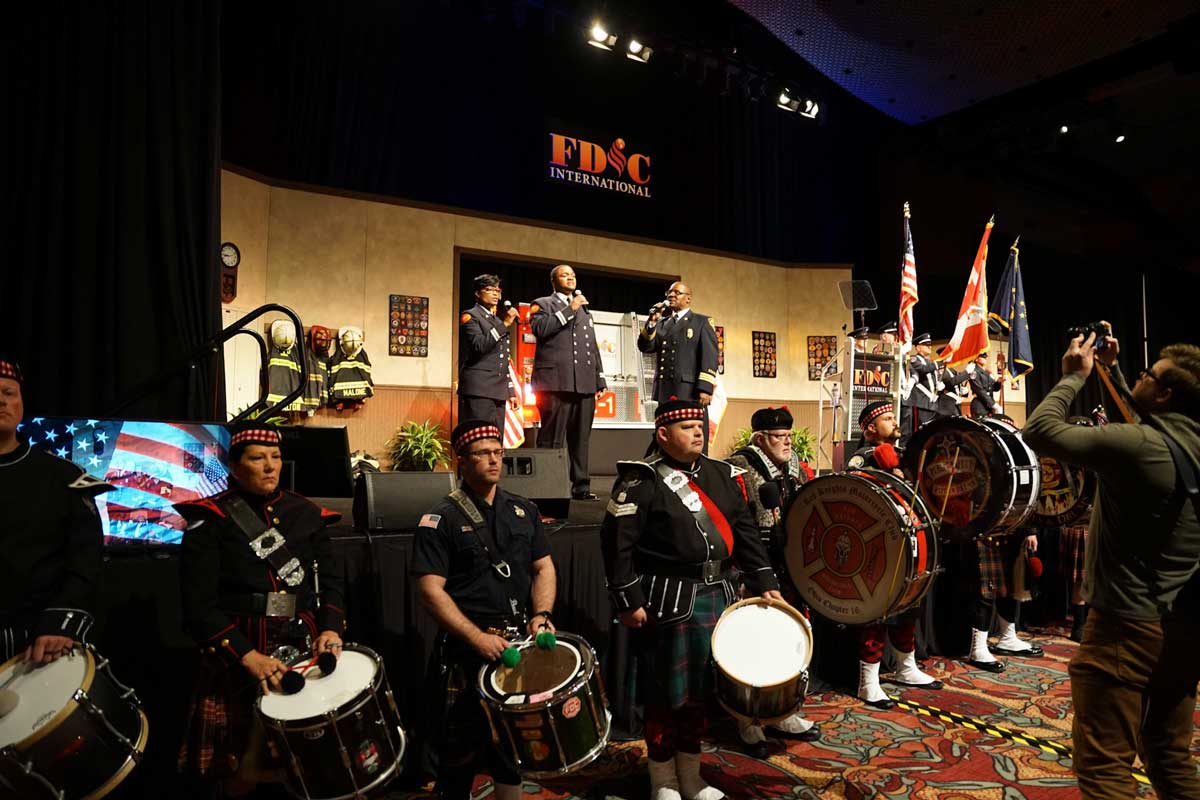 Voices of IFD perform national anthems at FDIC International 2022