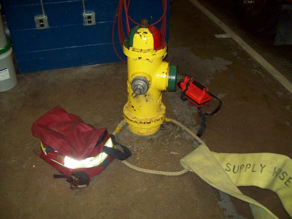 hydrant kit with fire hydrant and rope on supply hoseline