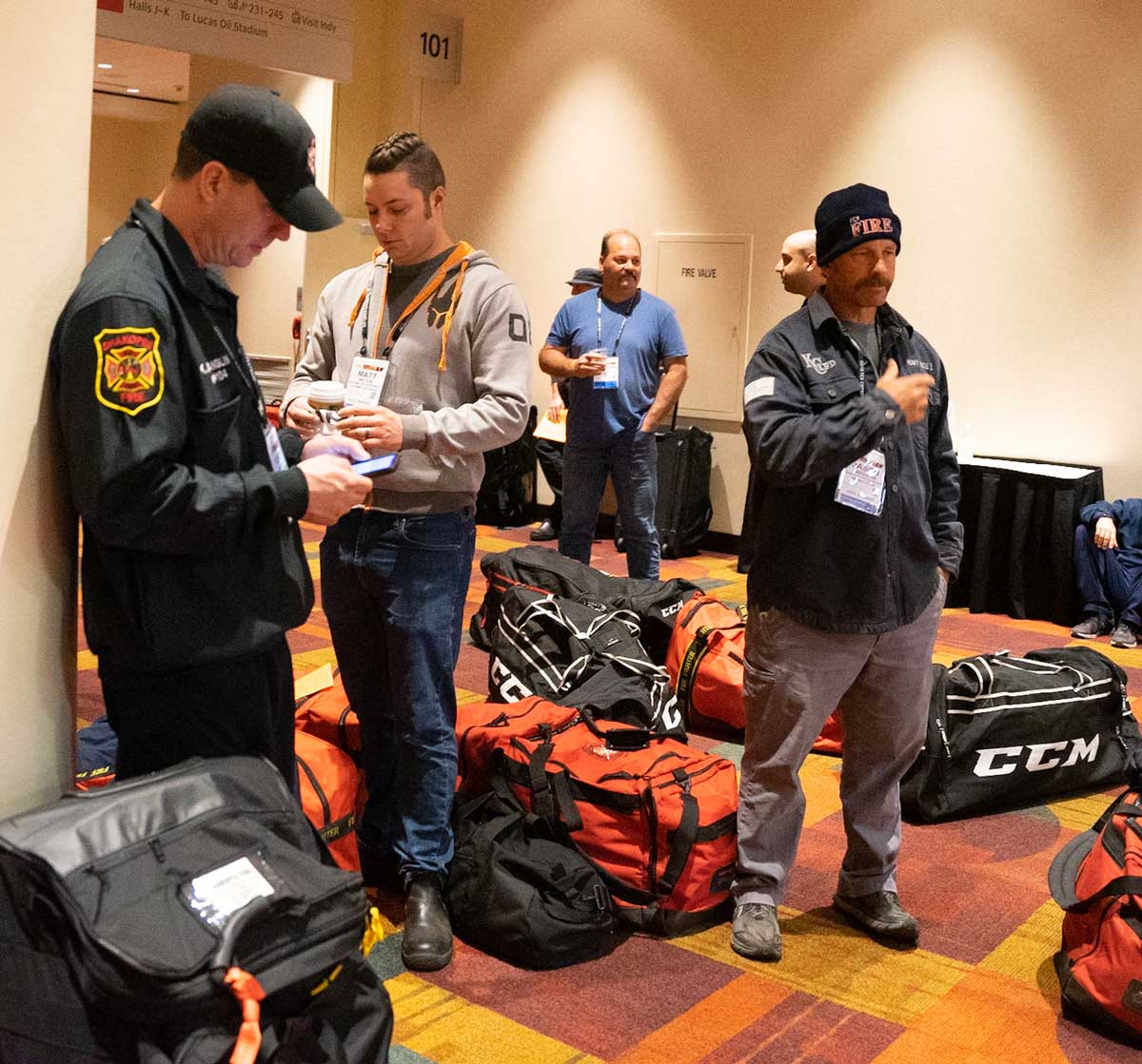 Firefighter with bags ready for hands-on training at FDIC