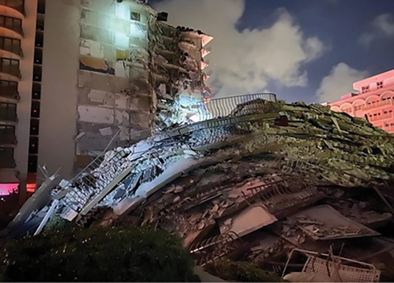 A view of the collapsed portion of the building from what was left of the pool deck area on the C side.