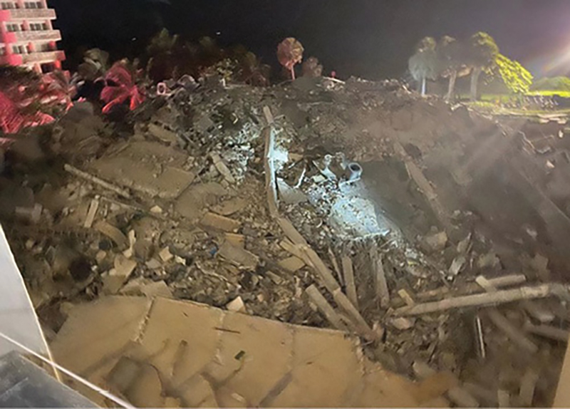 A view of the collapsed portion of the building from the stairwell landing.