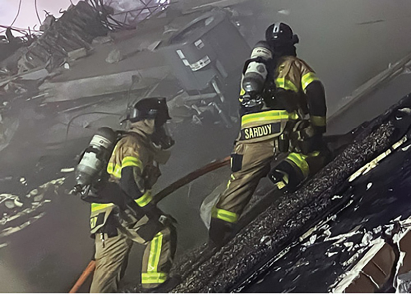 Engine 6’s crew advanced a handline over the debris to “surgically” direct their stream into cracks and openings in the rubble.