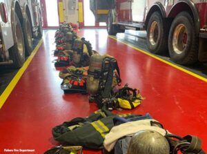 SCBA and firefighter gear in apparatus bay