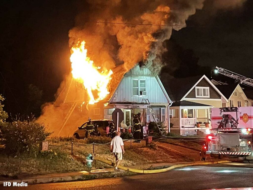 Indianapolis firefighters responding to house fire