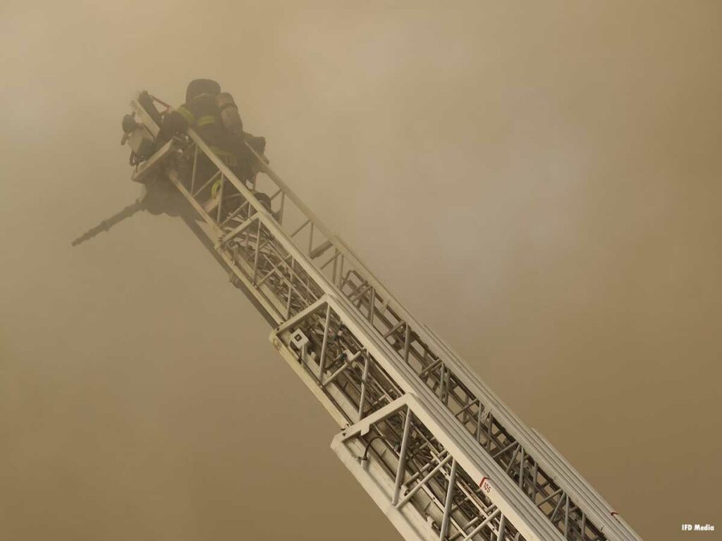 Indianapolis firefighter on aerial ladder