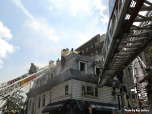 Firefighters on aerial ladders during multi-alarm Jersey City NJ fire