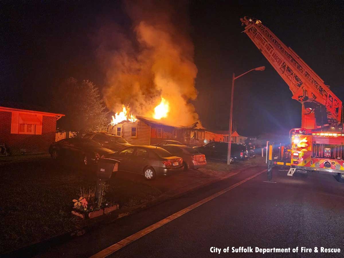 Suffolk aerial ladder with house fire