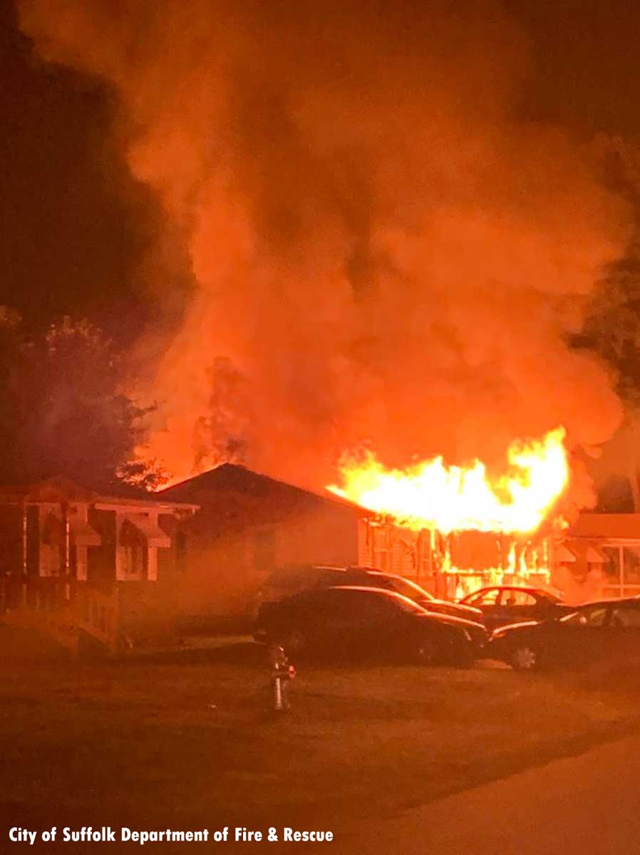 Vehicles and fire at residential house fire in Suffolk Virginia