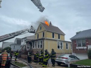 Firefighters respond to a three-alarm house fire in North Arlington, New Jersey