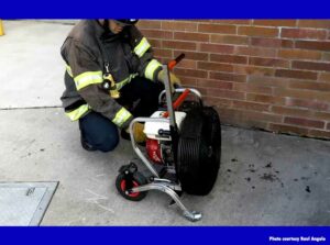 Firefighter with PPV fan