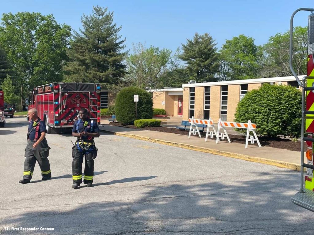 Firefighters and fire truck at Missouri school fire