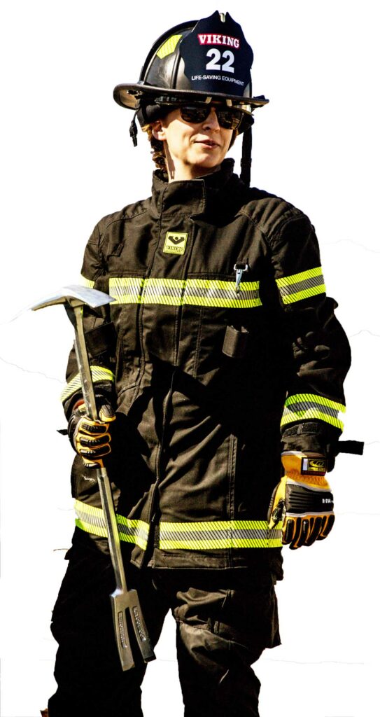 Firefighter in Viking turnout gear with halligan