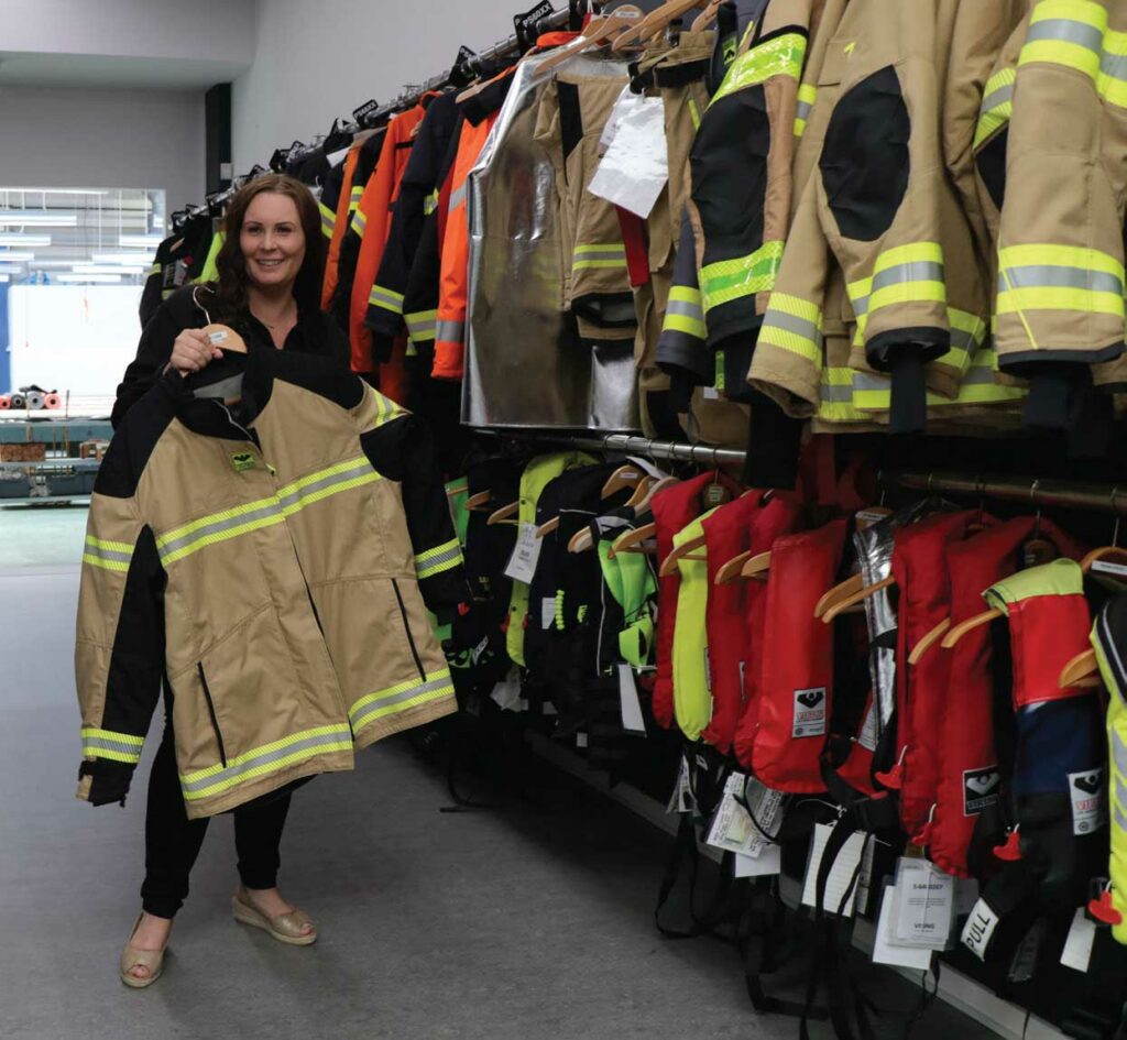 Camilla Callesen with firefighter turnout gear