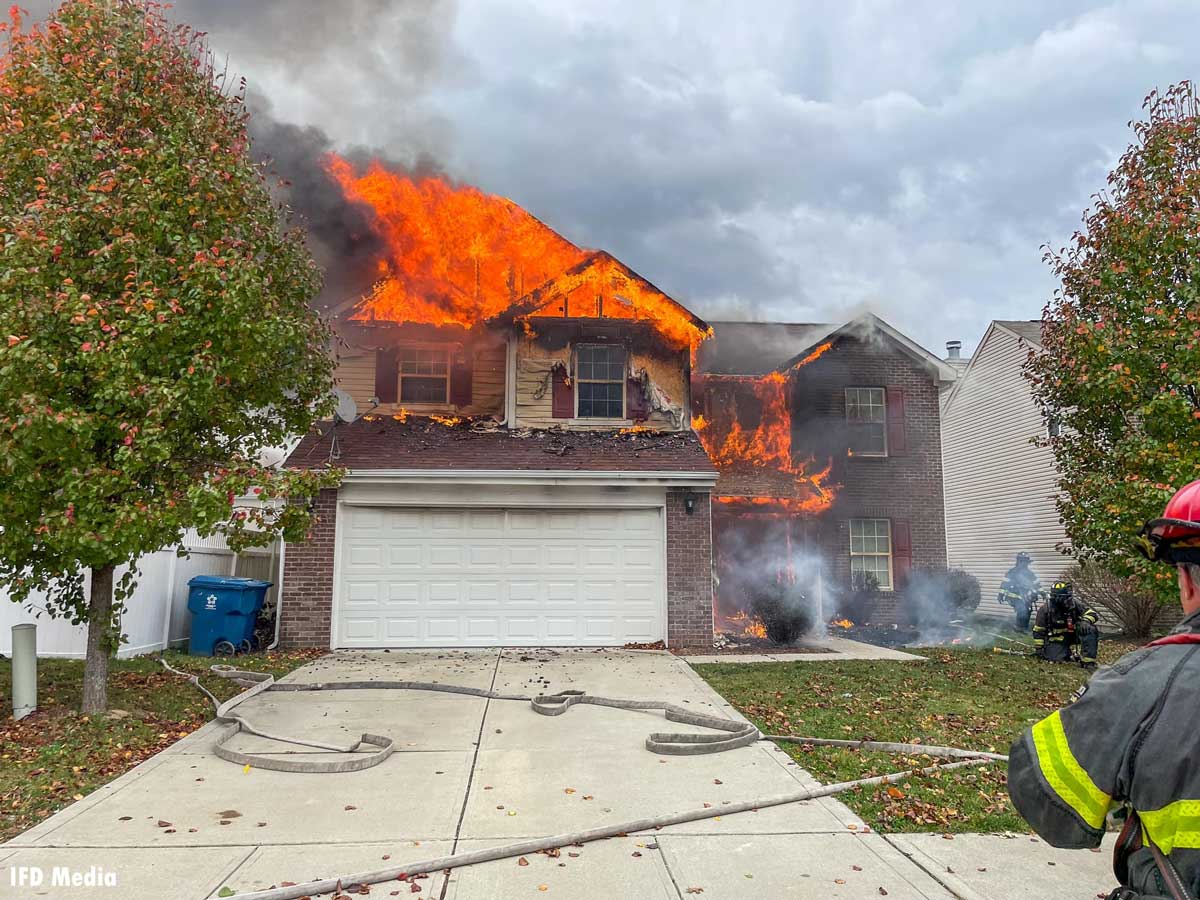 Flames shooting through a house in Indianapolis