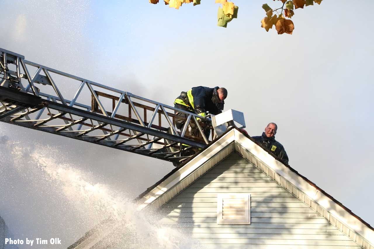 Chicago firefighters make the roof