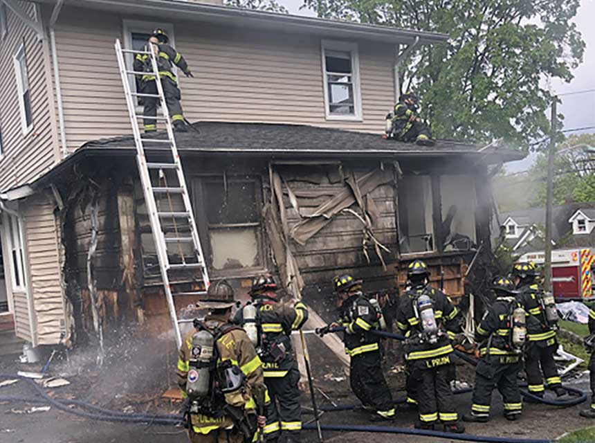 Firefighters at porch fire Wyckoff New Jersey