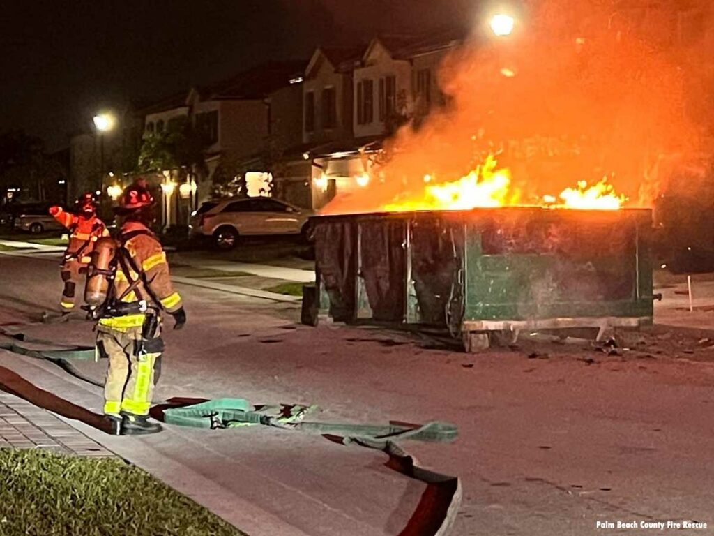 Palm Beach County Florida firefighters respond to dumpster fire