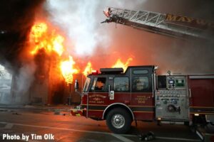 Aerial ladder at raging Maywood church fire