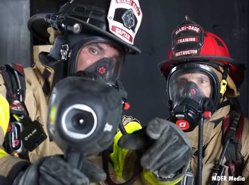 Firefighters search using a TIC