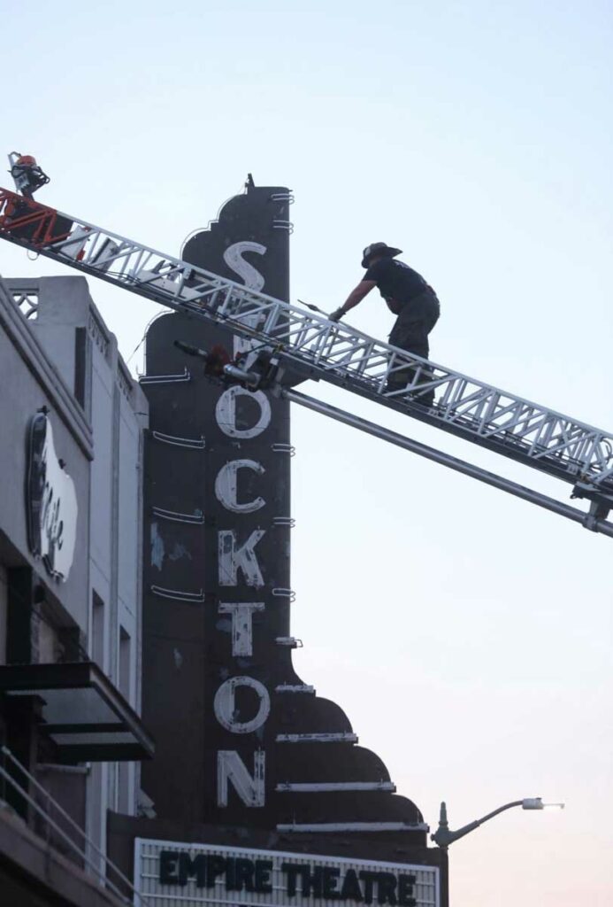 Stockton firefighter on aerial ladder