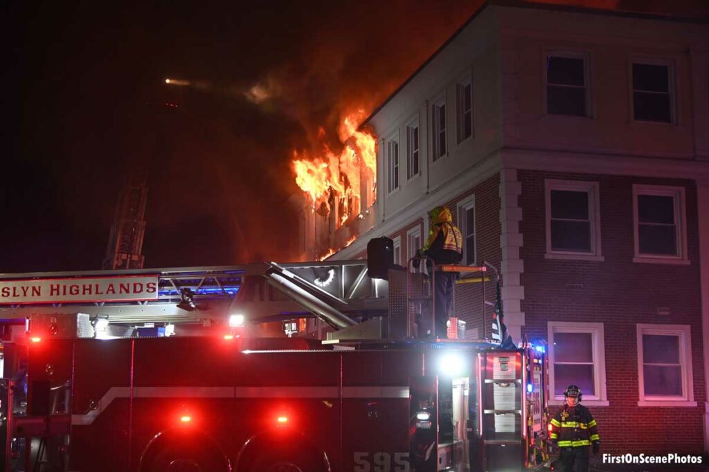 Flames roar from upper floor of Roslyn office building