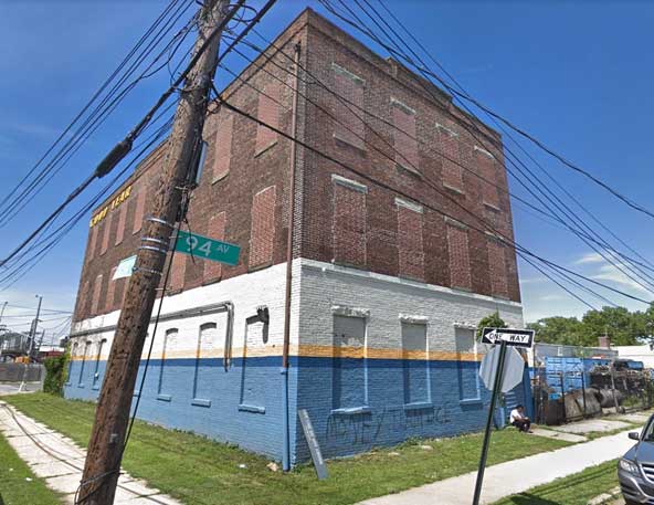 Building with bricks covering up windows