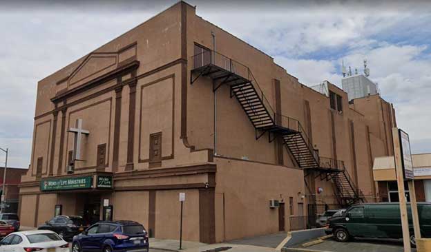 Church in large structure with fire escape