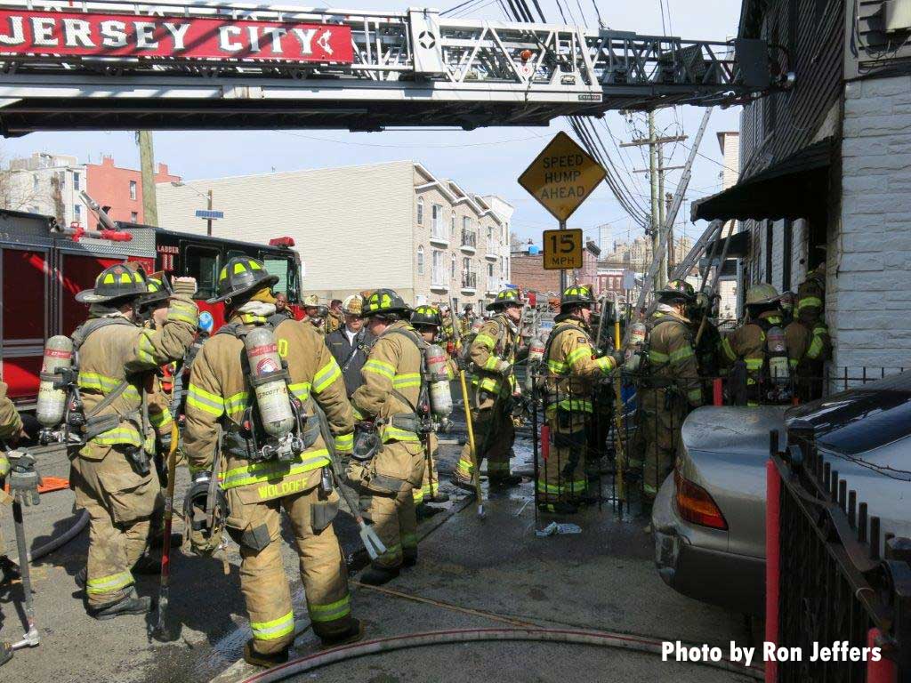 Jersey City companies and aerial at fire scene