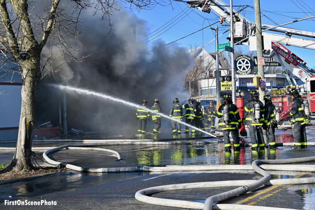 Firefighters use ground monitor master stream at Queens fire