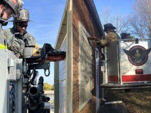 Forcible entry cutting from tower ladder