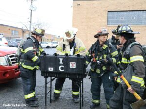 Firefighters and incident commander at Des Plaines fire