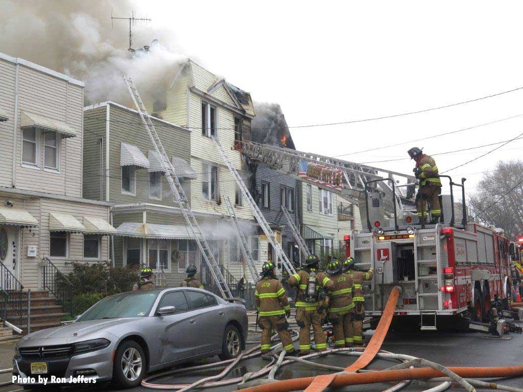 Array of ladders and aerial ladder at Jersey City fire