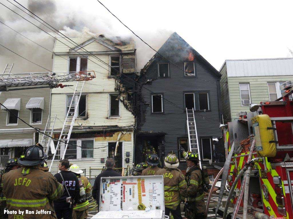 Ladders and firefighters at Jersey City fire