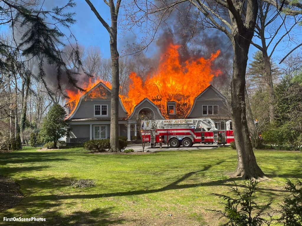 Flames roar from large house fire in East Norwich New York