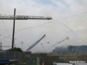 Multiple aerials and tower ladder at Jersey City fire