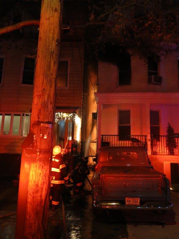 Firefighters put water between buildings at Weehawken fire